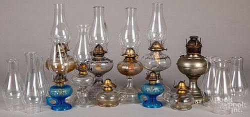 Ten glass fluid lamps.