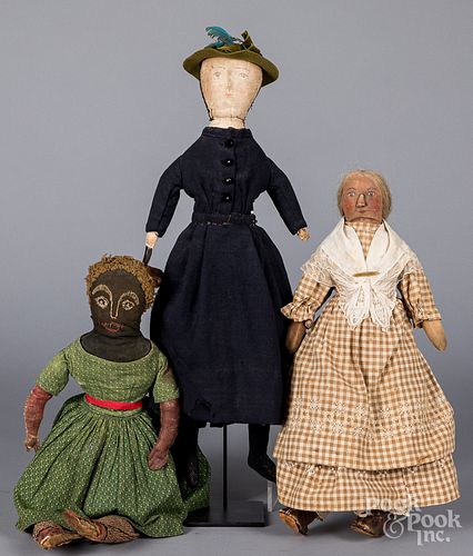 Three early folk art cloth dolls