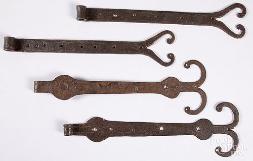 Two pairs of wrought iron rams horn hinges