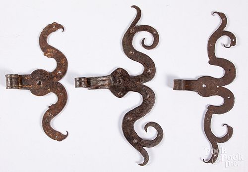 Three wrought iron rams horn hinges