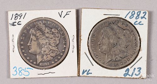 Two Morgan silver dollars