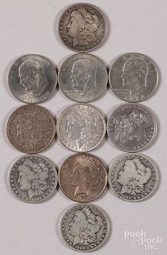 Seven Morgan silver dollars, etc.