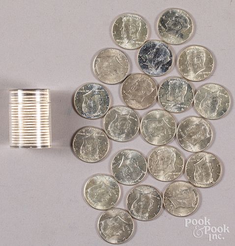 Forty 1964 Kennedy silver half dollars.