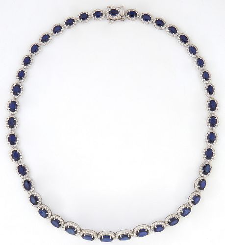 14K White Gold Link Necklace, each of the 42 links with an oval blue sapphire atop a border of tiny round diamonds, total sapphire weight- 35.31 cts.,