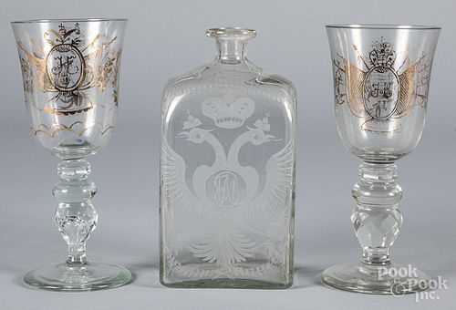 Engraved glass bottle, with heraldic eagles, etc.