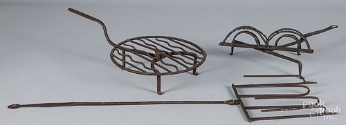 Three pieces of wrought iron cookware