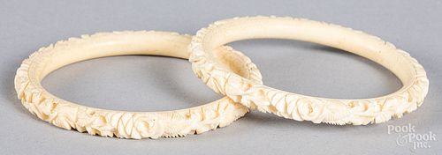 Two Chinese carved bone bangle bracelets