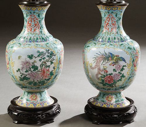 Pair of Oriental Enamel Baluster Vases, late 19th c., with floral and dragon decoration, now on carved ebonized bases and wired as lamps, H.- 18 in., 