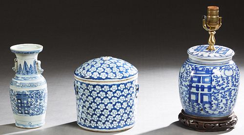 Three Pieces of Chinese Blue and White Porcelain, 20th c., consisting of a covered circular jar with floral decoration; a covered baluster jar with do