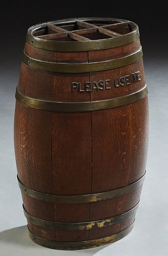 English Brass Bound Oval Oak Barrel Umbrella Stand, early 20th c., with the words "Please Use Me," in relief iron letters, on one side, H.- 25 3/4 in.