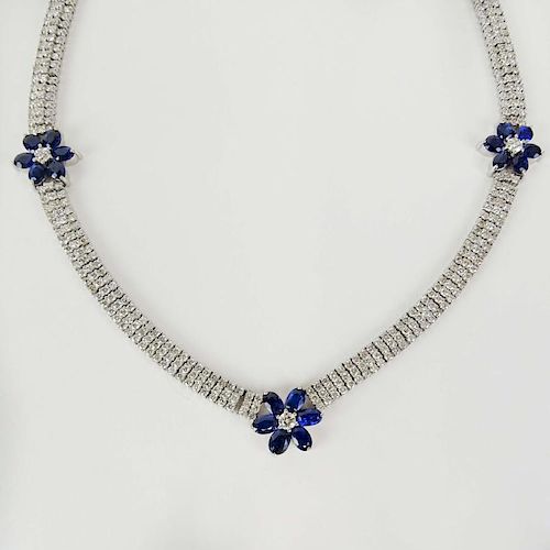 Lady's Approx. 17.0 Carat Round Cut Diamond, 7.50 Carat Oval Cut Sapphire and 18 Karat White Gold Necklace.
