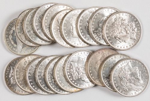 Twenty BU Morgan silver dollars.