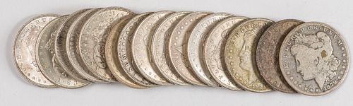 Fifteen Morgan silver dollars.