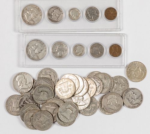 Twenty-nine Franklin silver half dollars, etc.