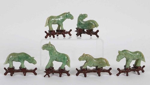 Six Carved Jade Horses on Stands