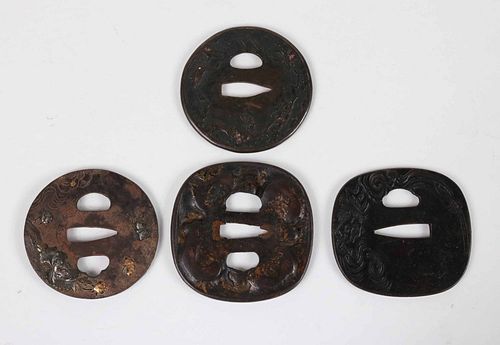 Four Japanese Bronze and Iron Tsuba