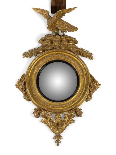 An Irish Giltwood Convex Mirror 
Height approx. 60 x width 36 inches.