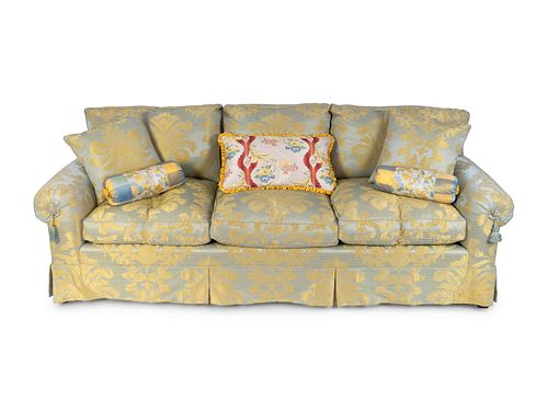 An Upholstered Three Cushion Sofa in Aqua and Gold Silk Damask
Height 33 x width 91 inches.