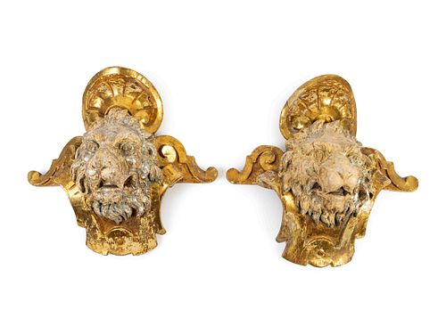 A Pair of English Part Silvered Giltwood Lion MasksHeight 20 x width 26 inches.