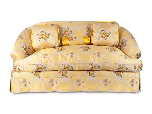 An Upholstered Loveseat with Three Cushions
Height 33 x width 68 inches.