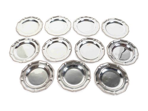 Eleven English Silver Georgian Style Dinner Plates
Diameter 9 3/4 inches.