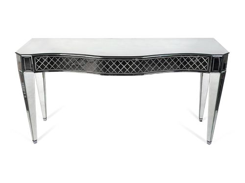A Contemporary Etched Glass Console Table
Height 33 x width 65 1/2 x depth 22 1/2 inches.