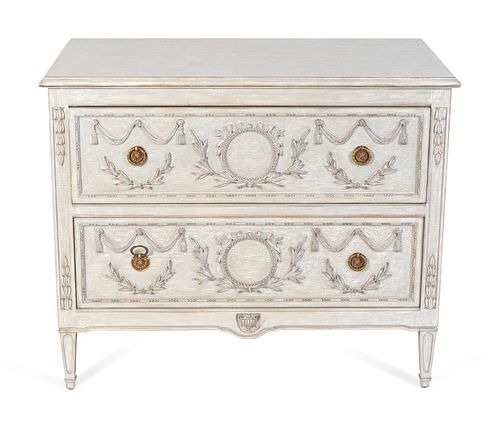 A Louis XVI Style Painted Commode
Height 33 1/2 x length 40 1/2 x depth 21 inches.