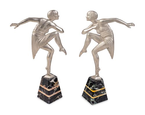 A Pair of Art Deco Silvered Metal Dancers on Marble Bases Signed Janle
Height 16 inches.