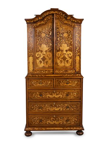 A Dutch Baroque Style Marquetry Cabinet
Height 82 1/2 x width 36 1/2 x depth 24 1/2 inches.