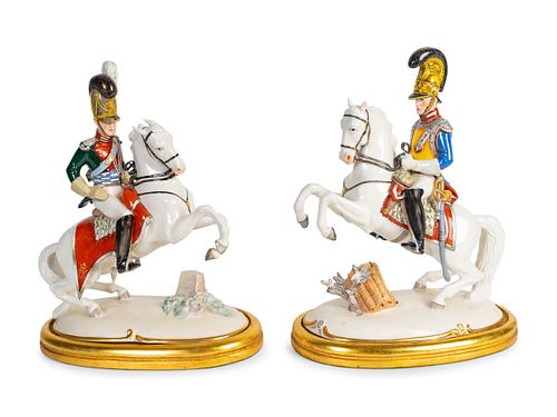 A Pair of Nymphenberg Porcelain Military Figures on Horseback
Height 13 1/2 inches.
