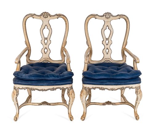 A Set of Four Italian Rococo Style Carved and Painted Armchairs
Height 42 x width 22 x depth 18 inches.