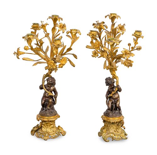 A Pair of Louis XV Style Gilt and Patinated Bronze Five-Light Candelabra
Height 24 inches.