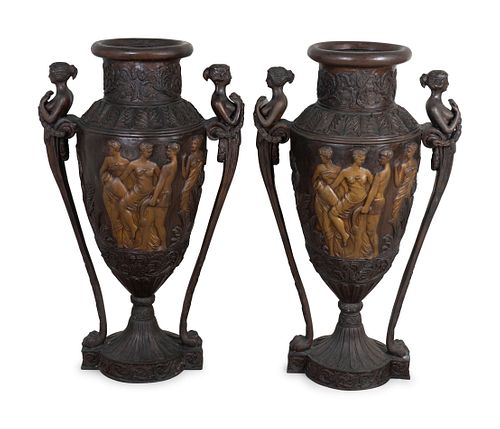 A Pair of Neoclassical Style Bronze Urns
Height 46 inches.