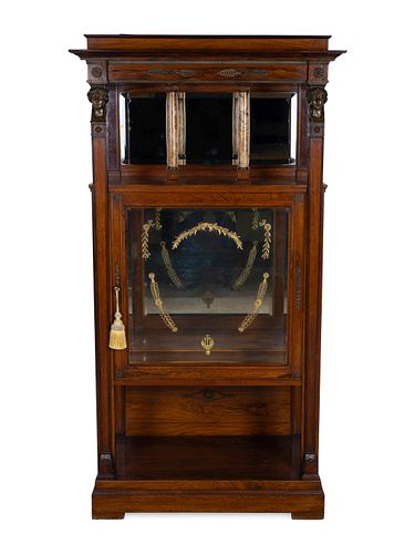 An Empire Style Gilt-Metal-Mounted Rosewood Etagere
Height 66 1/2 x width 32 x depth 18 inches.
