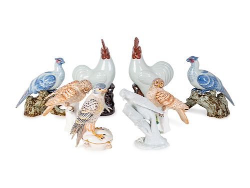 Ten Ceramic Figures of Birds and a Pair of Mottahedeh Recumbent Horses Heights 7 to 12 3/4 inches.