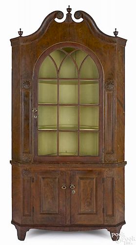 Pennsylvania painted pine two-part corner cupboard, early 19th c., probably Berks County