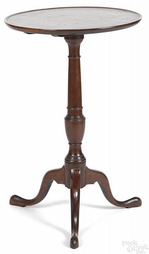 Pennsylvania mahogany candlestand, late 18th c., with a dish top and urn standard, 28 1/4'' h.