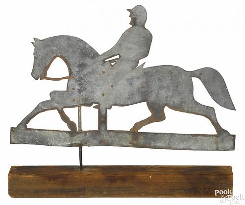 Zinc weathervane of a horse and rider, early 20th c., 23'' h., 31'' l.