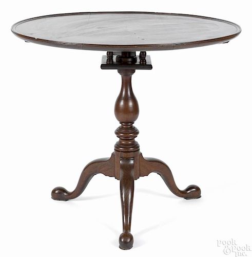 Pennsylvania Queen Anne walnut tea table, late 18th c., with a dish top and birdcage support