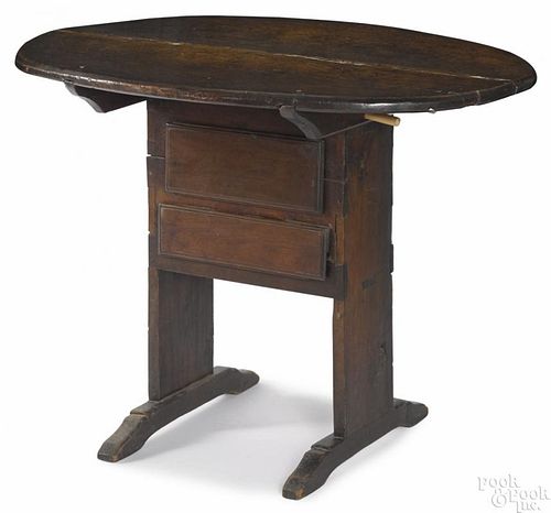 New England walnut shoe foot table, early 18th c., 28'' h., 37 1/4'' w., 26 1/2'' d.