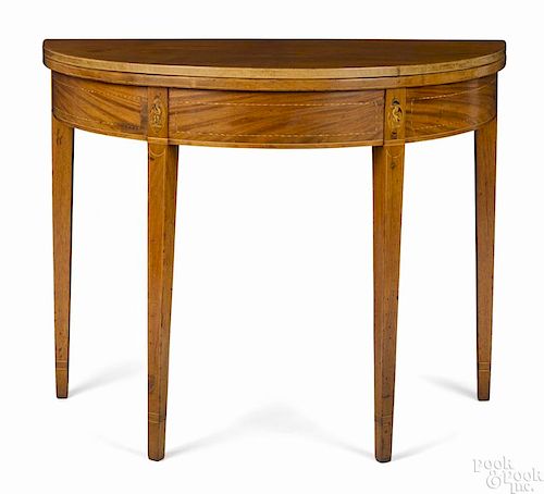 Mid-Atlantic Hepplewhite mahogany card table, ca. 1800, with griffin inlaid capitals, 29'' h.