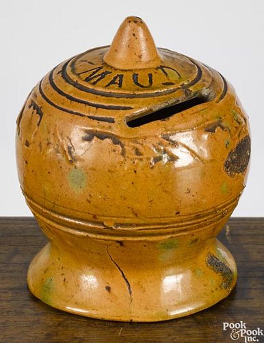 Pennsylvania redware bank, dated 1888, inscribed Maud, with a band of stamped flowers