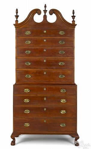 New England Chippendale birch chest on chest, ca. 1790, having a broken arch with carved rosettes