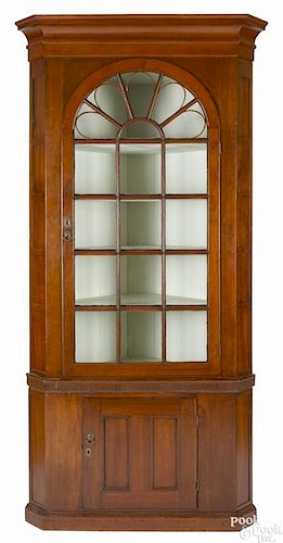 Pennsylvania two-part pine and poplar corner cupboard, early 19th c., 97 1/4'' h., 42 1/2'' w.
