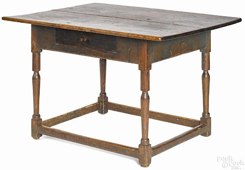 New England Pine tavern table, late 18th c., with a stretcher base, 28'' h., 43 1/2'' w., 33'' d.