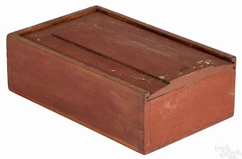 Pennsylvania painted cherry slide lid box, 19th c., retaining an old red surface, 2 1/2'' h., 8'' w.
