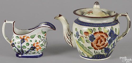 Gaudy Dutch porcelain carnation teapot and creamer, 19th c.