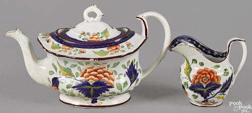 Gaudy Dutch porcelain in the grape pattern, 19th c., to include a teapot, 5 1/2'' h., and a creamer