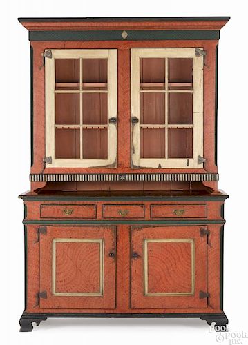 Pennsylvania painted pine two-part Dutch cupboard, ca. 1790, retaining a later painted surface