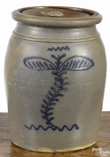 Pennsylvania two-gallon lidded crock, 19th c., with cobalt dragonfly decoration, 11 1/4'' h.